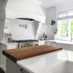 hamptons inspired transitional kitchen design in Portland with beautiful fresh materials in bright white and airy blue hues