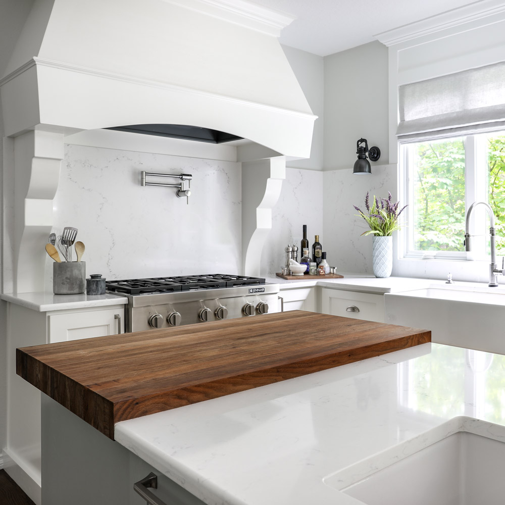 hamptons inspired transitional kitchen design in Portland with beautiful fresh materials in bright white and airy blue hues