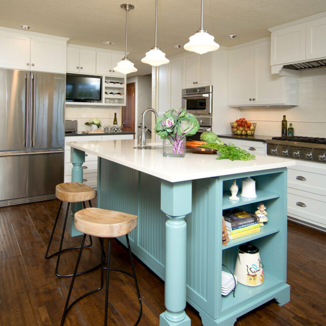 Brand new remodeled vintage farmhouse kitchen in Portland features cottage and retro cabinetry and light fixtures