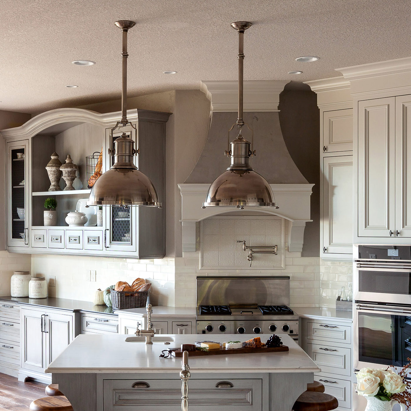 This stunning french traditional kitchen remodel is a blend of french country kitchen styling with a hint of traditional and Industrial