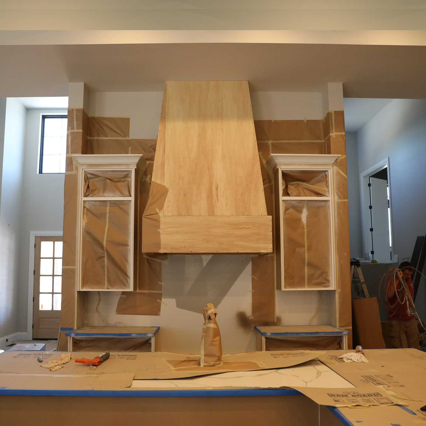 This luxury modern farmhouse kitchen in Happy Valley offers a blend of clean uncomplicated modern lines and a touch of farmhouse architectural details