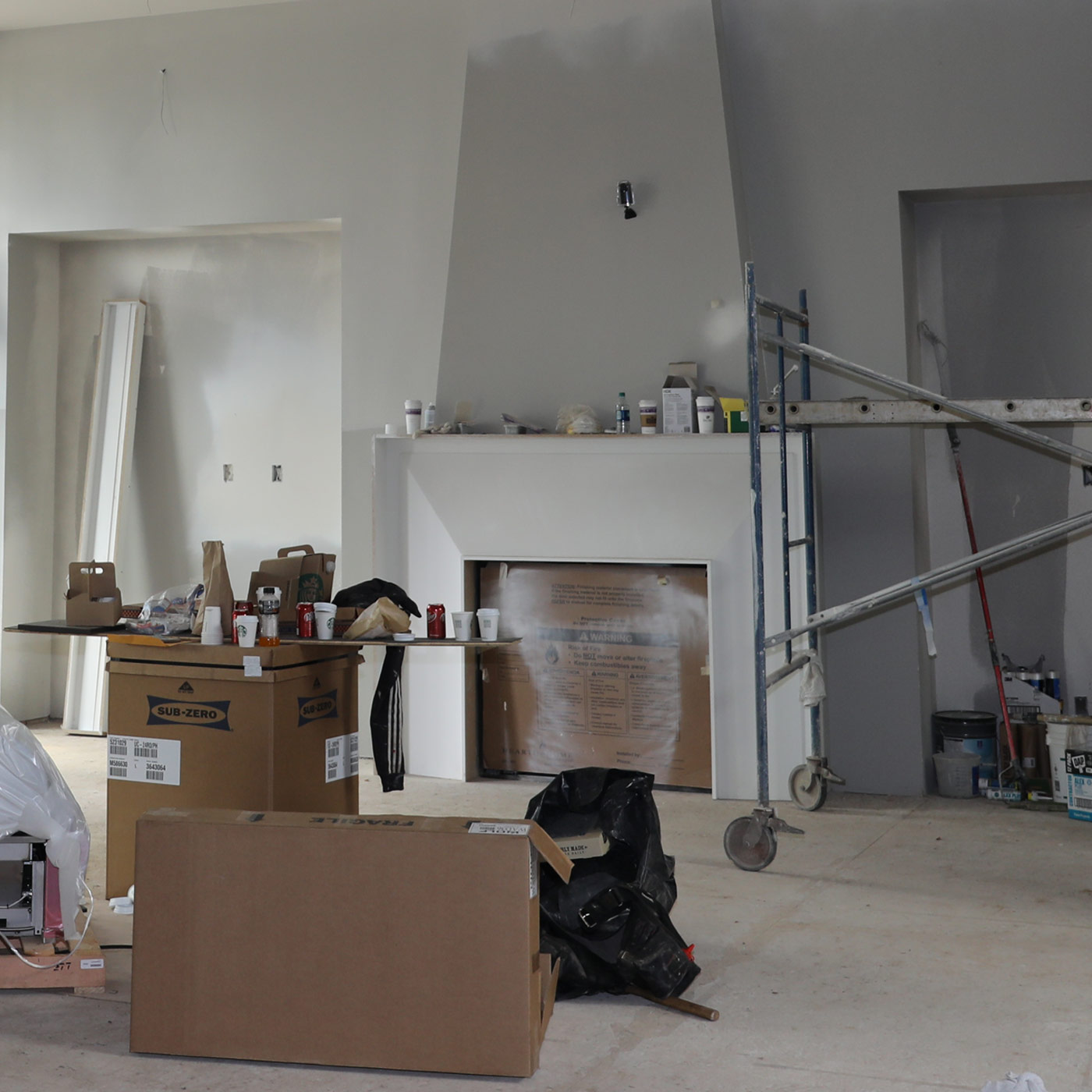 This luxury modern farmhouse living room in Happy Valley offers a blend of clean uncomplicated modern lines and a touch of farmhouse architectural details