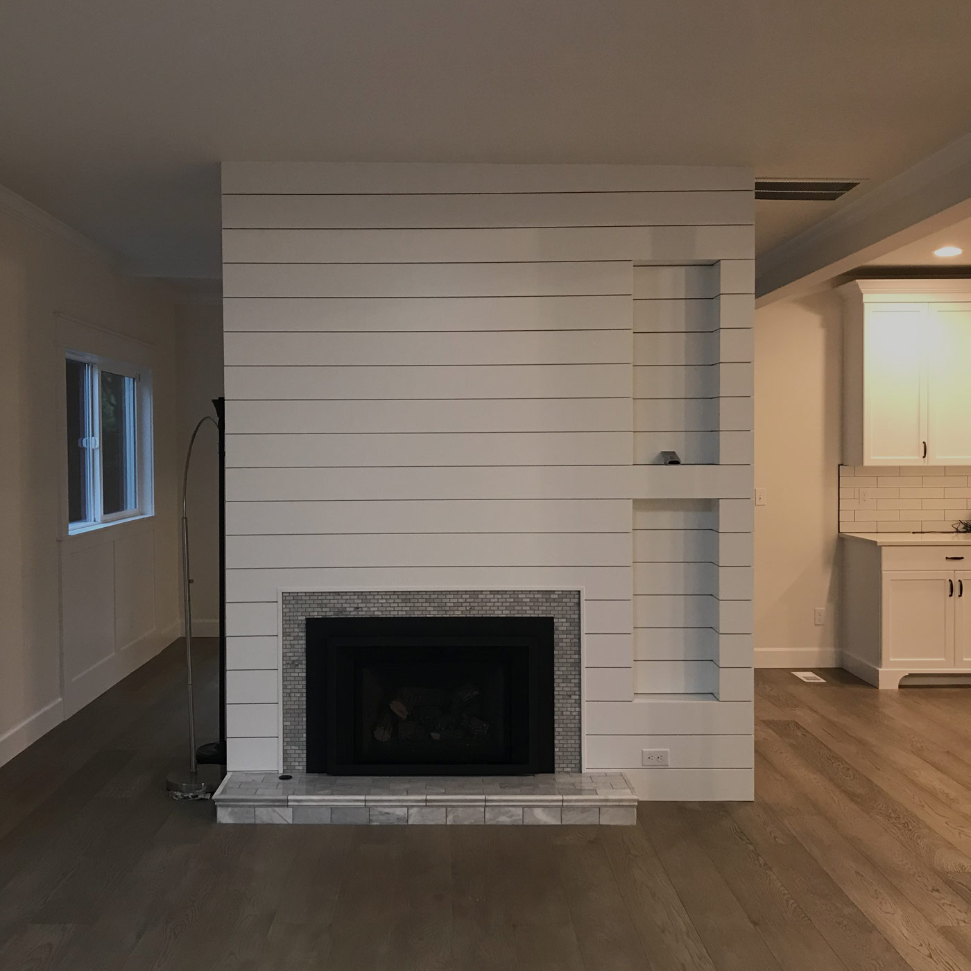 vintage modern farmhouse remodel in hawthorne with updated furnishings, window treatments and accessories in a blend of clean lines and relaxed style