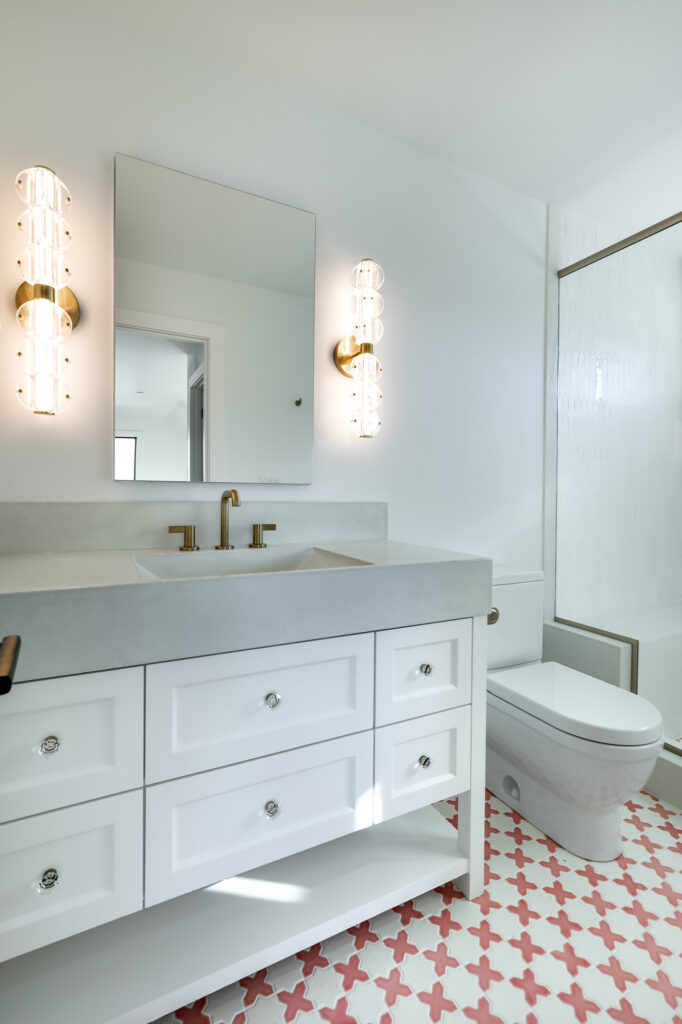 modern farmhouse girl's bathroom with pink tiles