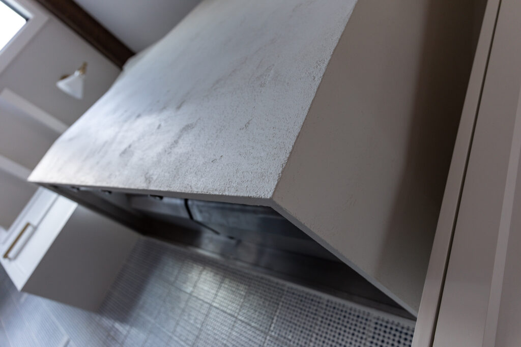 modern farmhouse kitchen textured concrete hood