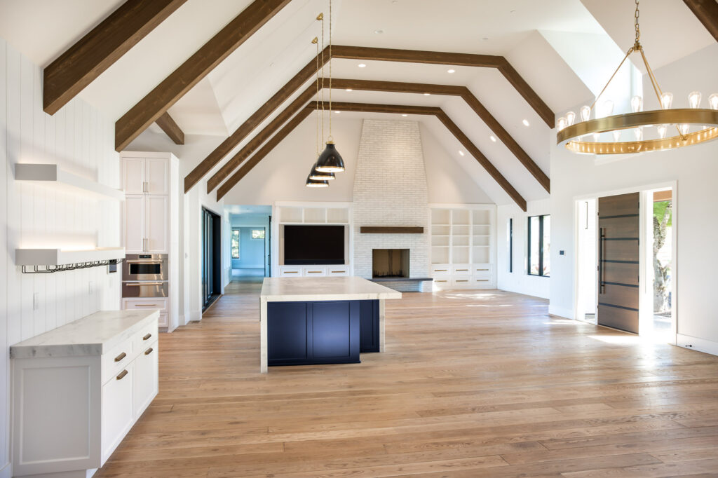 modern farmhouse large family room with vaulted ceilings